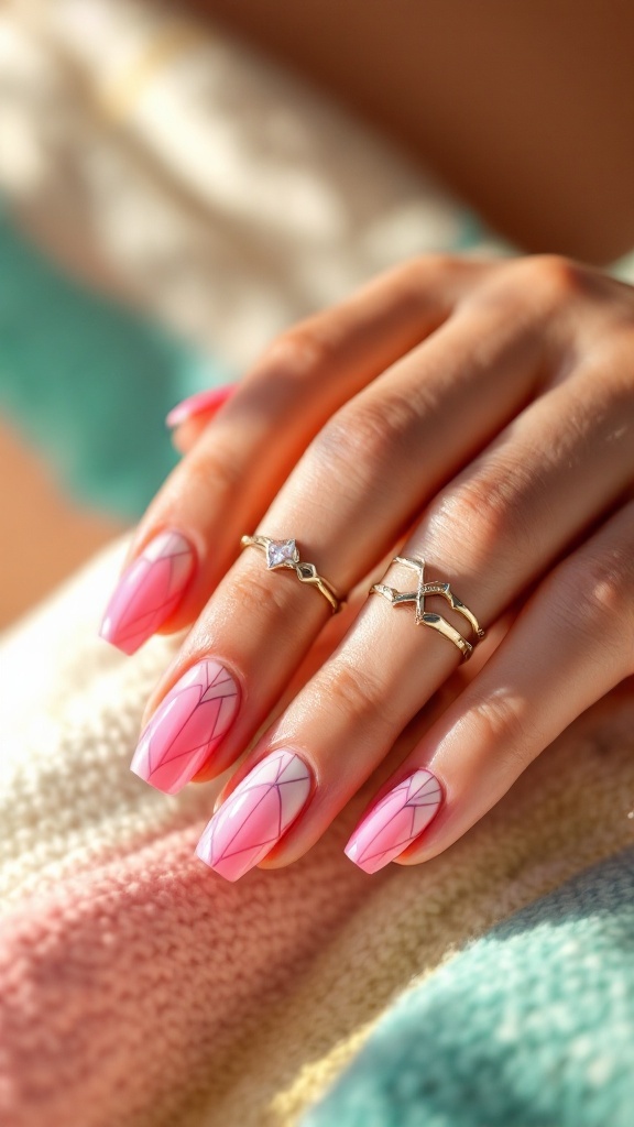 19 Simple Summer Nail Designs Best to Try in 7 Close-up of hands with bold pink geometric nail design and simple gold rings